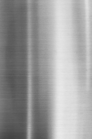 Metal background or texture of brushed steel plate with reflections Iron plate and shinyの写真素材