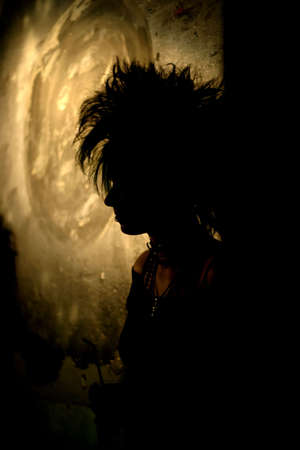 silhouette of a punk/gothic womanの写真素材