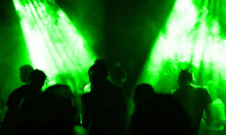 Silhouettes of dancing peopleの写真素材