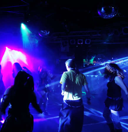 Silhouettes of dancing people