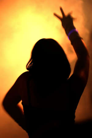 Silhouettes of a dancing womanの写真素材