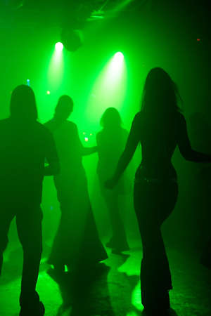 Dancing people in an underground clubの写真素材
