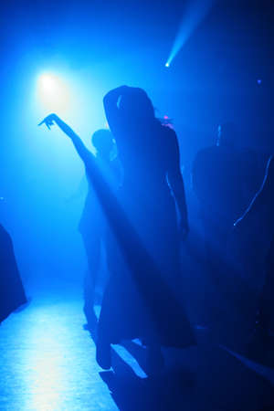 Dancing people in an underground clubの写真素材