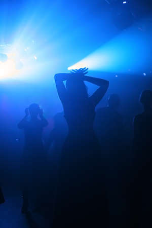 Dancing people in an underground clubの写真素材