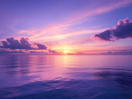 A breathtaking view of the vast ocean at sunset, with vibrant purple and blue hues in the sky, reflecting on the calm waters. The tranquil scene captures nature's beauty, creating an atmosphere of serenity and awe. This high-resolution photograph was captured using a Canon EOS R5 camera, resulting in stunning resolution and clarity. --ar 4:3 --v 6.1 Job ID: 69bee58c-9a21-4083-b981-2ba8d2a5275dの素材