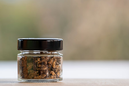 Jar of ready-to-eat salted fried Crickets with copy spaceの写真素材