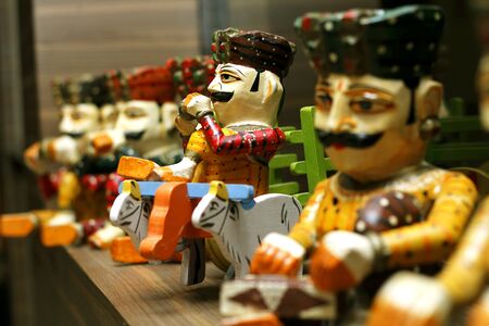 Conceptual wooden toys arranged properly on the window of the restaurantの写真素材