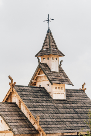 Part of Ancient wooden Slavic church. Historical and Architectural Museum in the open air. Kiev, Ukraine, Ancient park Kievskaya Rus'.の写真素材