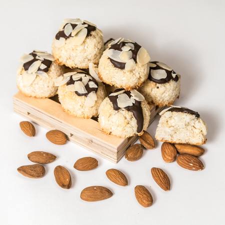 Coconut biscuits with almonds isolated on a white background, closeup, square pictureの写真素材
