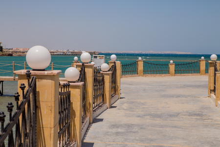 a sea pier and a wooden platform near the shore of the Red Seaの写真素材