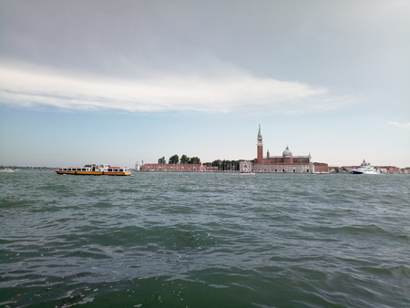 city canals venice with water and houses and bridgesの写真素材
