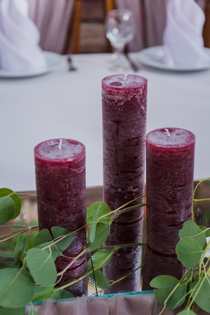 red candles on the table newlywed decorの写真素材