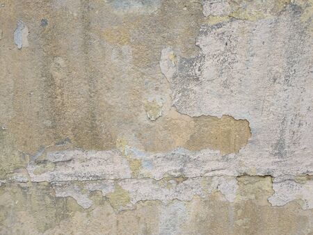 old brick wall yellow brick and with cracksの写真素材