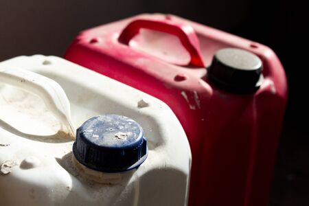 dirty plastic canisters for repairing a mixtureの写真素材