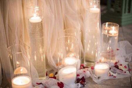 wedding decor in restaurant of candles floorの写真素材