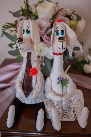 plush toys bride and groom with ringsの写真素材