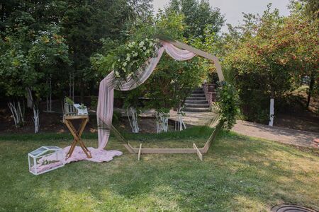 decor of arches and chairs for wedding ceremonyの写真素材