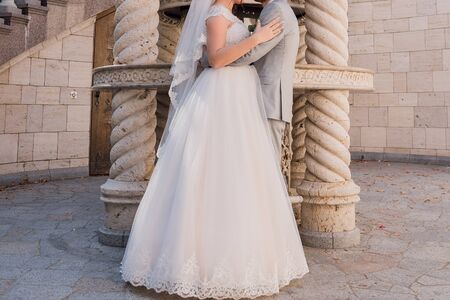 bride in the park one summer at a weddingの写真素材