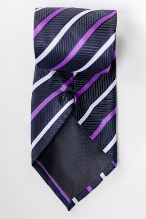 striped tie on white backgroundの写真素材