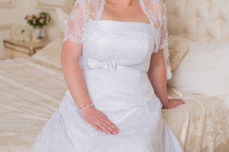 bride in a room in wedding dressの写真素材