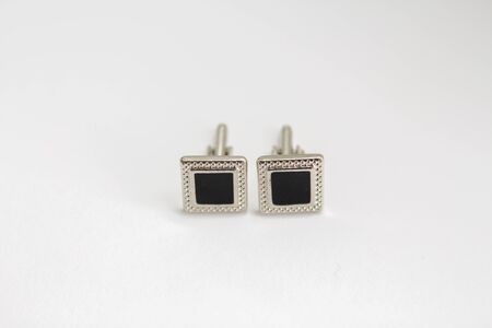 cufflinks on white backgroundの写真素材