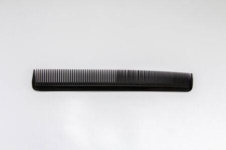 black comb on white backgroundの写真素材