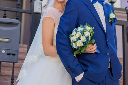 bride and groom on the veranda of houseの写真素材