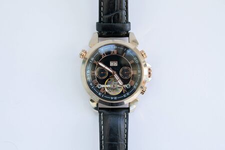men's gold watch with leather strapの写真素材