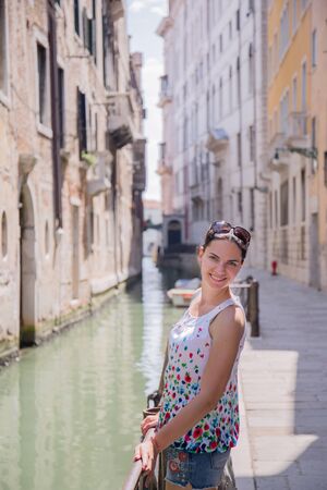 a woman in venice near the canalの写真素材