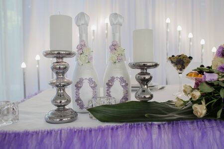 a wedding decor with champagne bottlesの写真素材