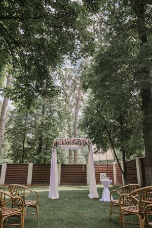 arch for a wedding ceremony of flowers in parkの写真素材