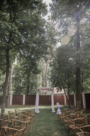 arch for a wedding ceremony of flowers in parkの写真素材