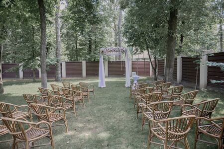 arch for a wedding ceremony of flowers in parkの写真素材
