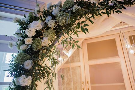 arch for ceremony with light bulbsの写真素材