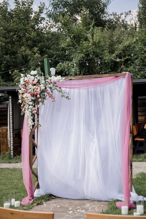arch for the wedding ceremony in parkの写真素材