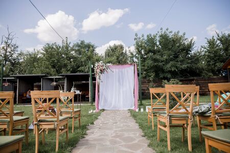 arch for the wedding ceremony in parkの写真素材