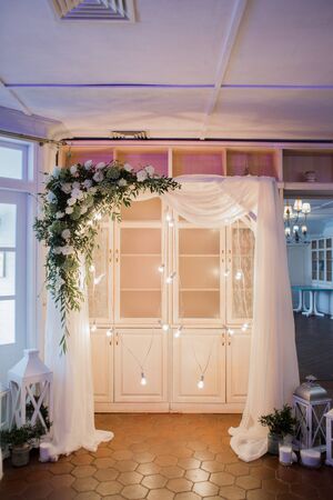 arch for ceremony with light bulbsの写真素材