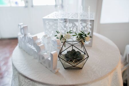 wedding rings in transparent boxの写真素材