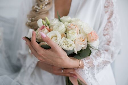 bride in a wedding dress with bouquetの写真素材
