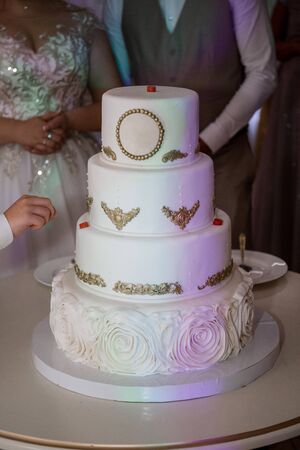 a wedding cake bride and groom