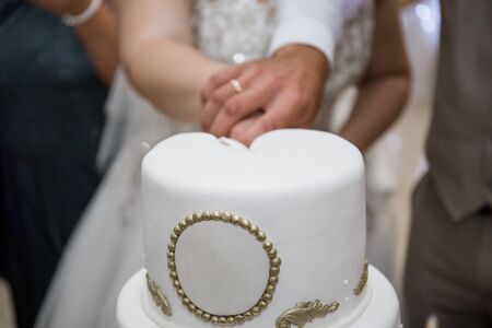 a wedding cake bride and groom