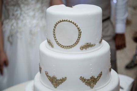 a wedding cake bride and groom
