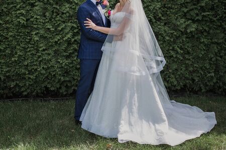 bride and groom in parkの写真素材