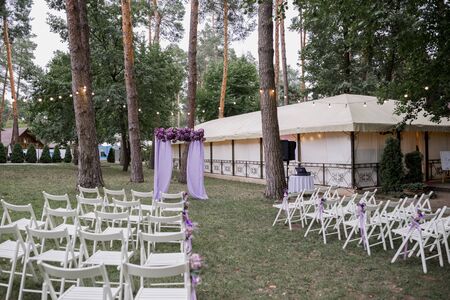 arch for wedding ceremony of flowers in the parkの写真素材