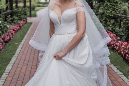 bride with a bouquet of flowers at weddingの写真素材
