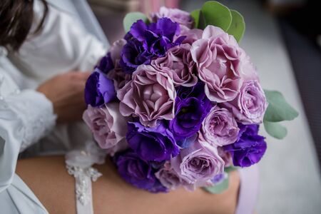 bride with a bouquet of flowers at weddingの写真素材