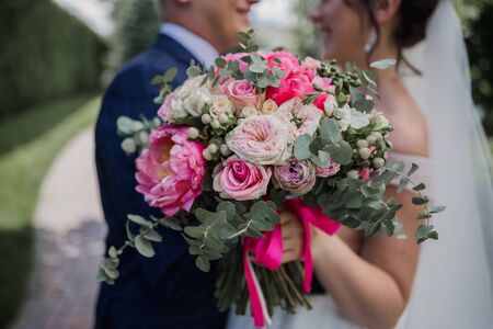bride and groom in parkの写真素材