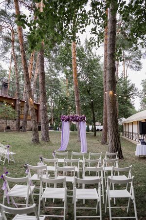 arch for wedding ceremony of flowers in the parkの写真素材