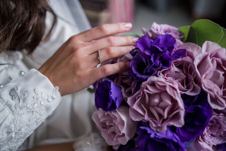 bride with a bouquet of flowers at weddingの写真素材