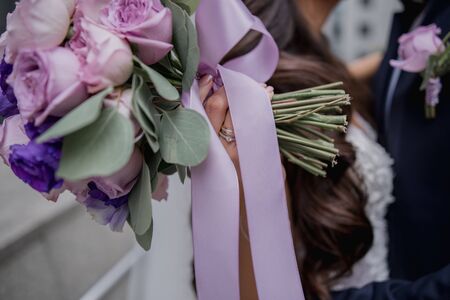 bride with a bouquet of flowers at weddingの写真素材